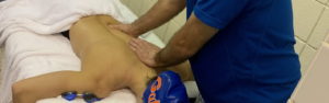 swimmer receiving massage after a meet